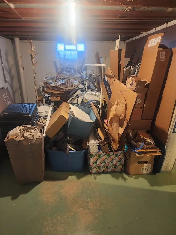 Roll-off dumpster container at job site for 20 Yard Dumpster Rental in Essex